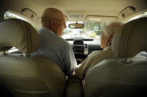 Seymour keeps the conversation light and friendly when driving passengers around the neighborhood. Here, he chats with ITN client William Gruner, 83, as they prepare to drive to a doctor's appointment.
