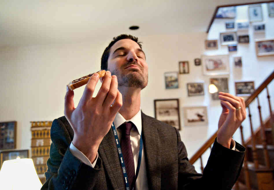 Raz savors his Marmite toast. He developed a love for the spread while living in England and eats it frequently.