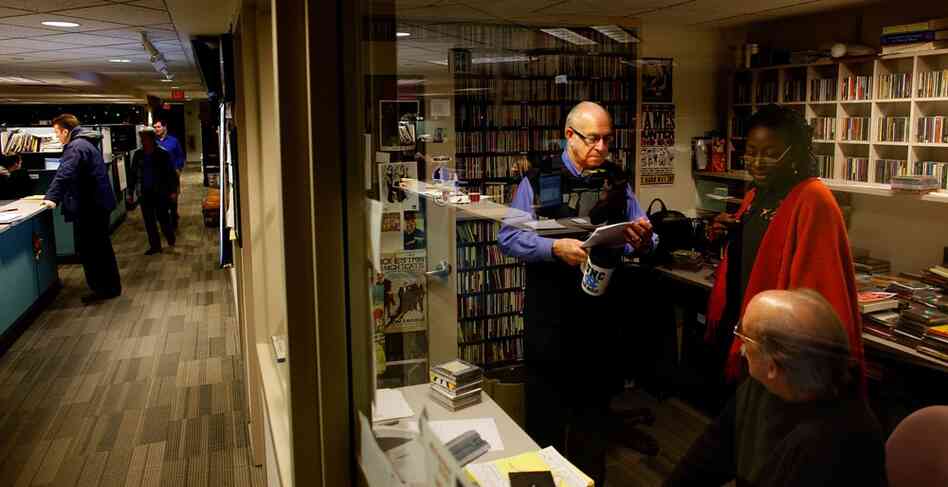 Kasell, who woke up at 1 a.m. to get ready for work, talks with Morning Edition producer Claudette Habermann and director Van Williamson at NPR's headquarters in Washington.