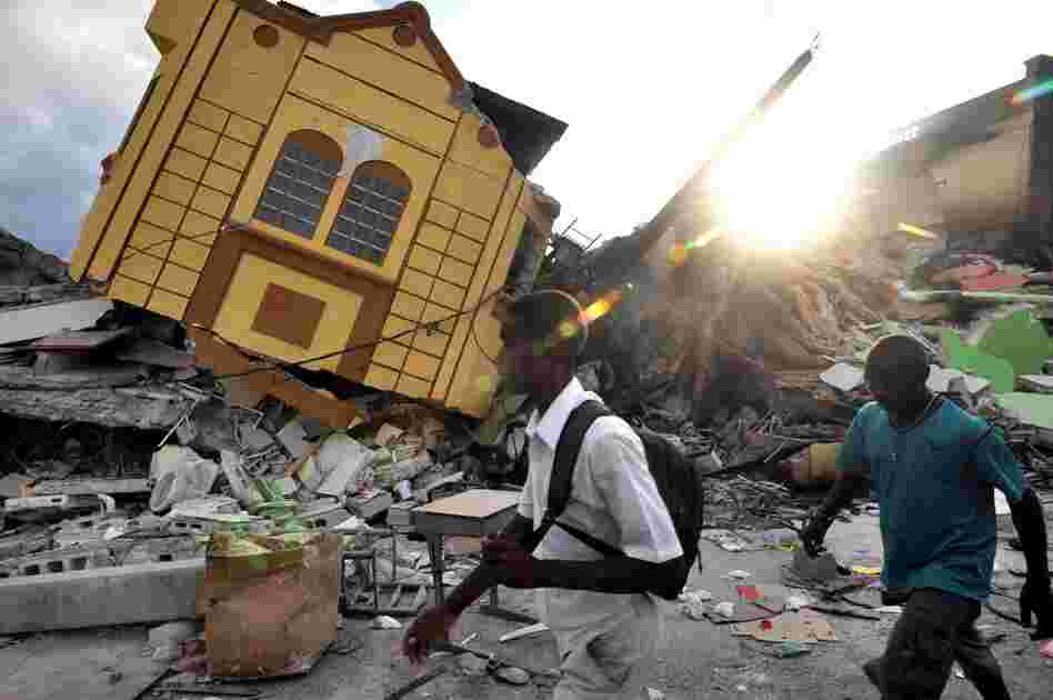 With thousands missing and the death toll climbing, dazed survivors wander amid the ruins of Port-au-Prince two days after the devastating earthquake.  