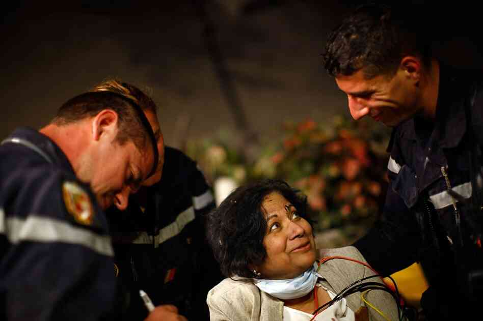 Sarla Chand, 65, from New Jersey, is in good condition after being rescued from the collapsed Hotel Montana in Port-au-Prince on Thursday. 