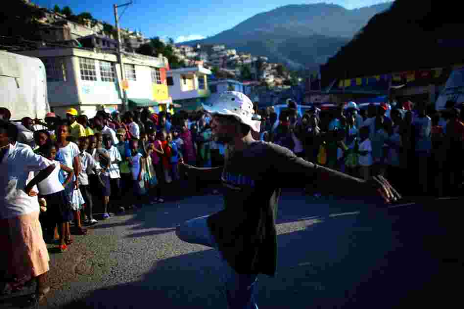 Haitians line up for U.N. food rations. Desperately needed aid is finally arriving in Port-au-Prince, but congestion at the airport is hampering efforts to get supplies to survivors.