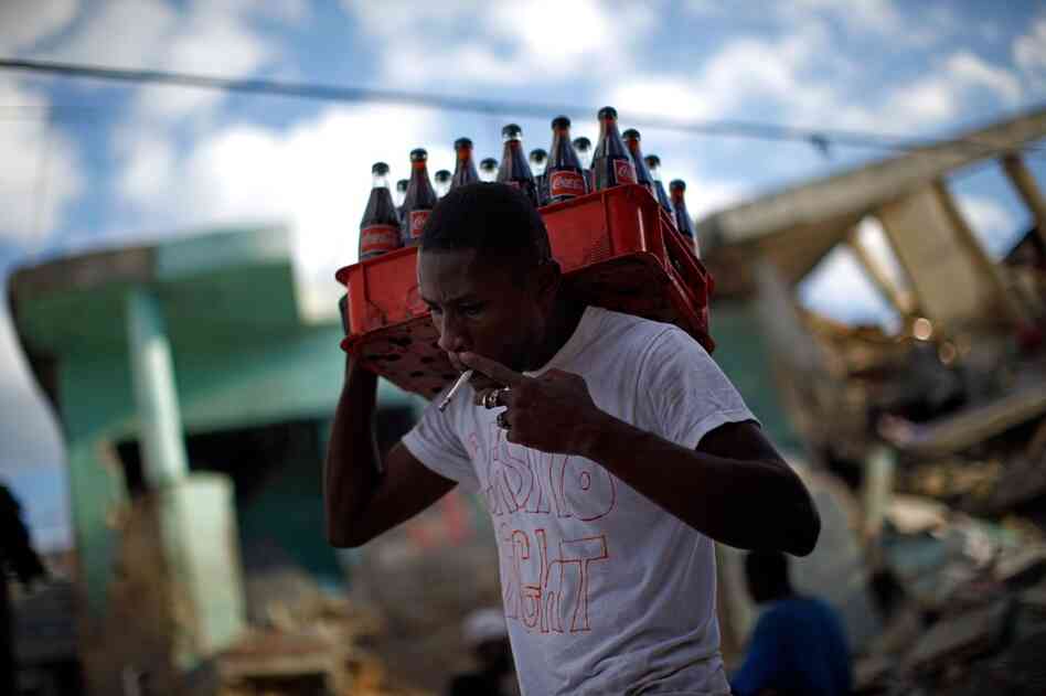 The streets are filled with people carrying their few remaining belongings.