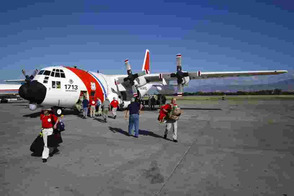 The team arrives at the Port-au-Prince Toussaint L'Ouverture Airport on Sunday after spending three days on the island of Providenciales in Turks and Caicos.
