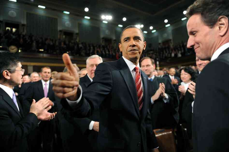 President Obama makes his way through the House chamber ahead of his first State of the Union address Wednesday. 