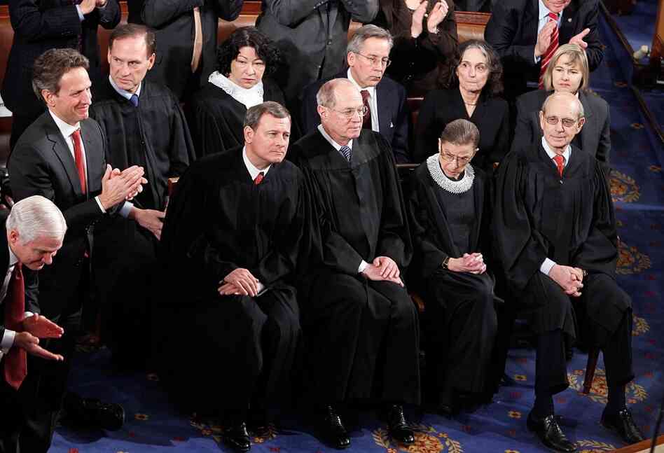 Members of the U.S. Supreme Court listen to Obama's speech. 