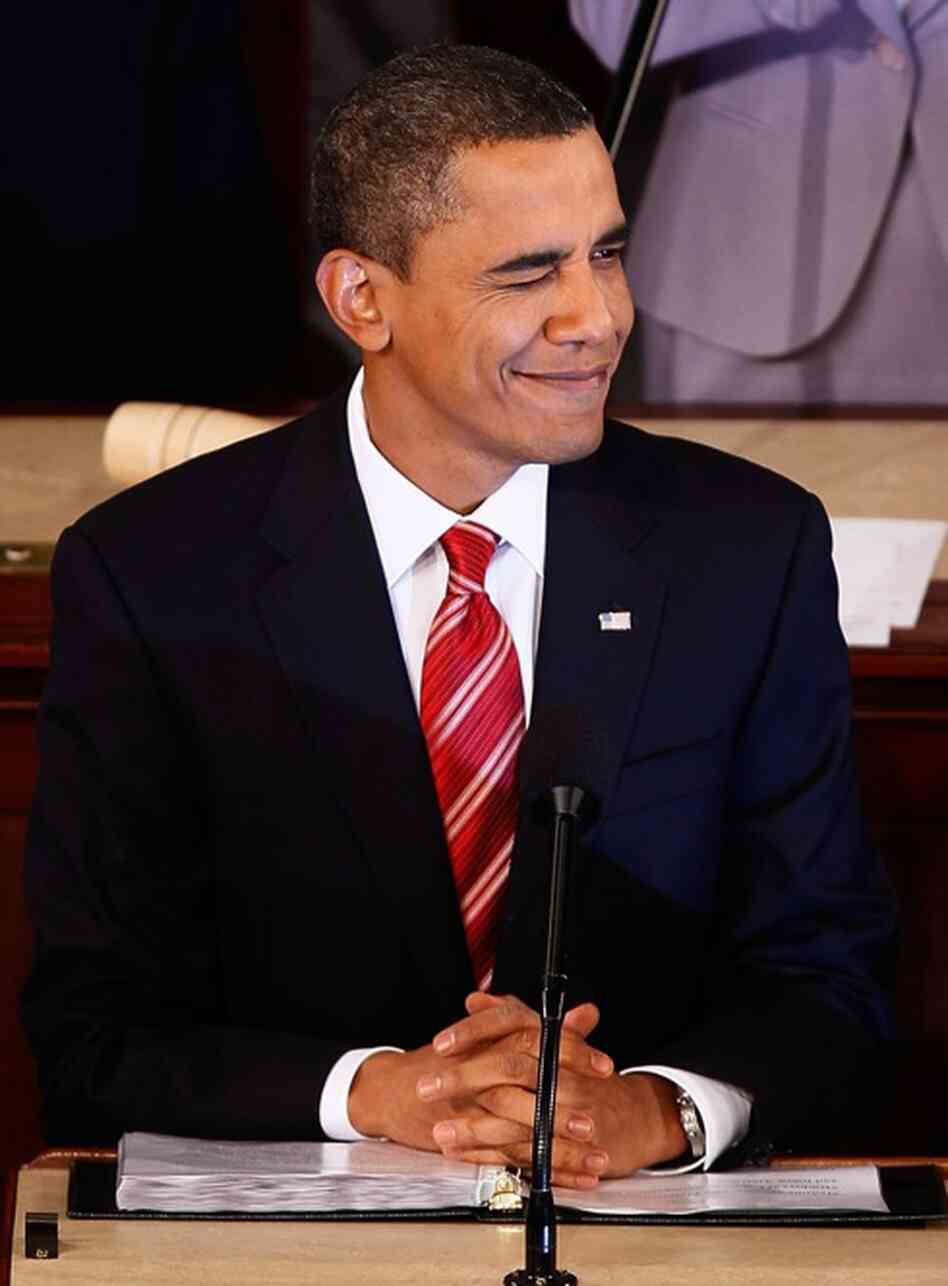 Obama winks while making a point. 