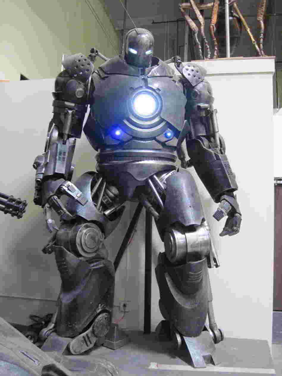 The Iron Monger's armor from Iron Man stands menacingly in the Legacy warehouse.