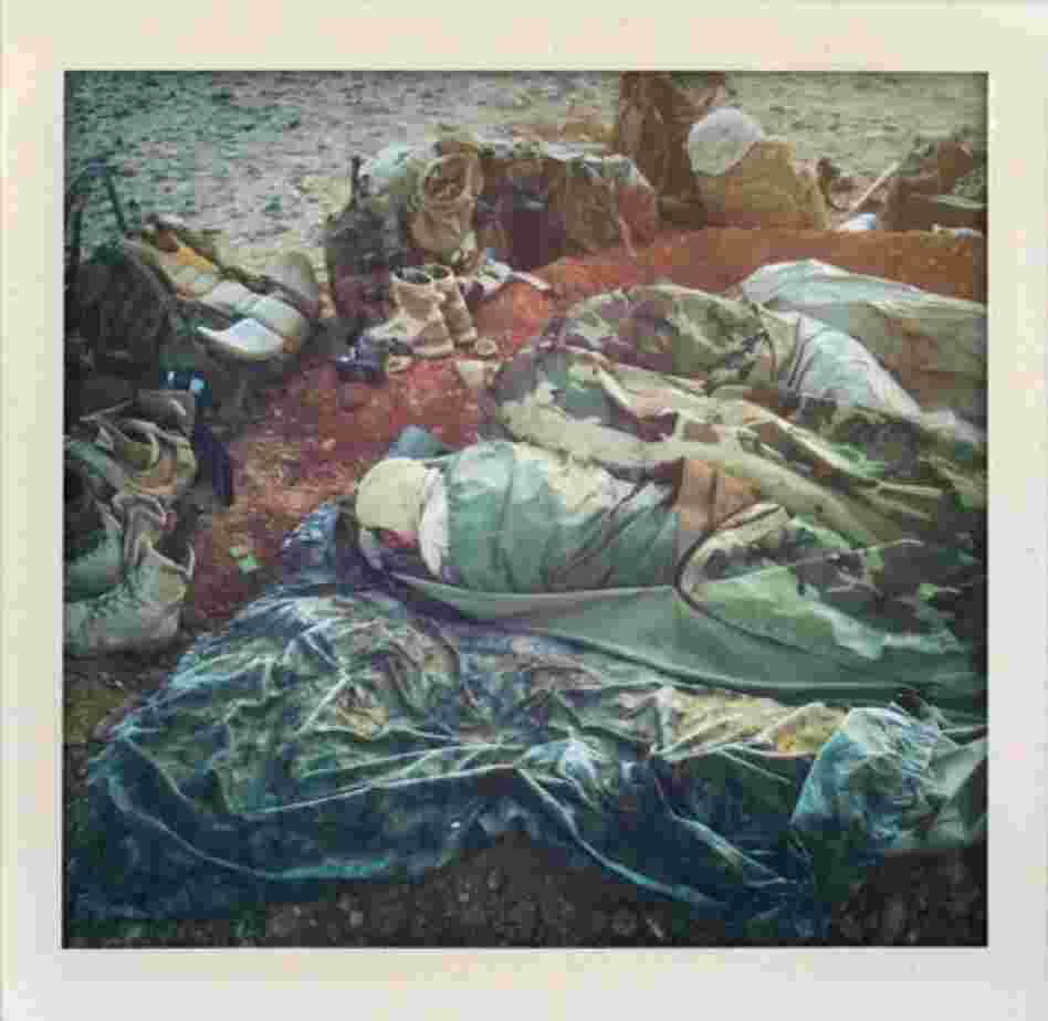 U.S. Marines sleep in fighting holes near Marjah.