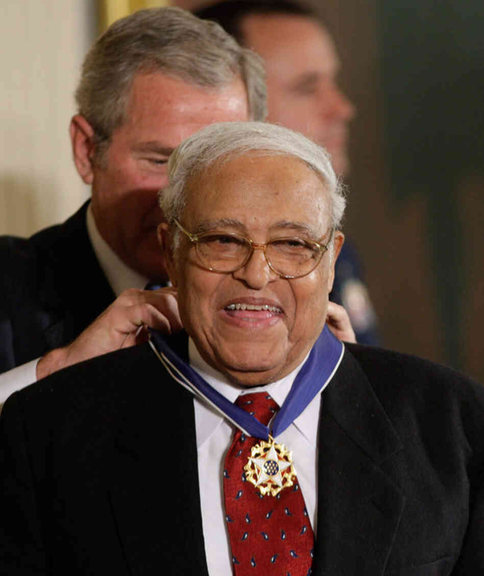 President Bush (left) presents the Presidential Medal of Freedom to Hooks on November 5, 2007. 