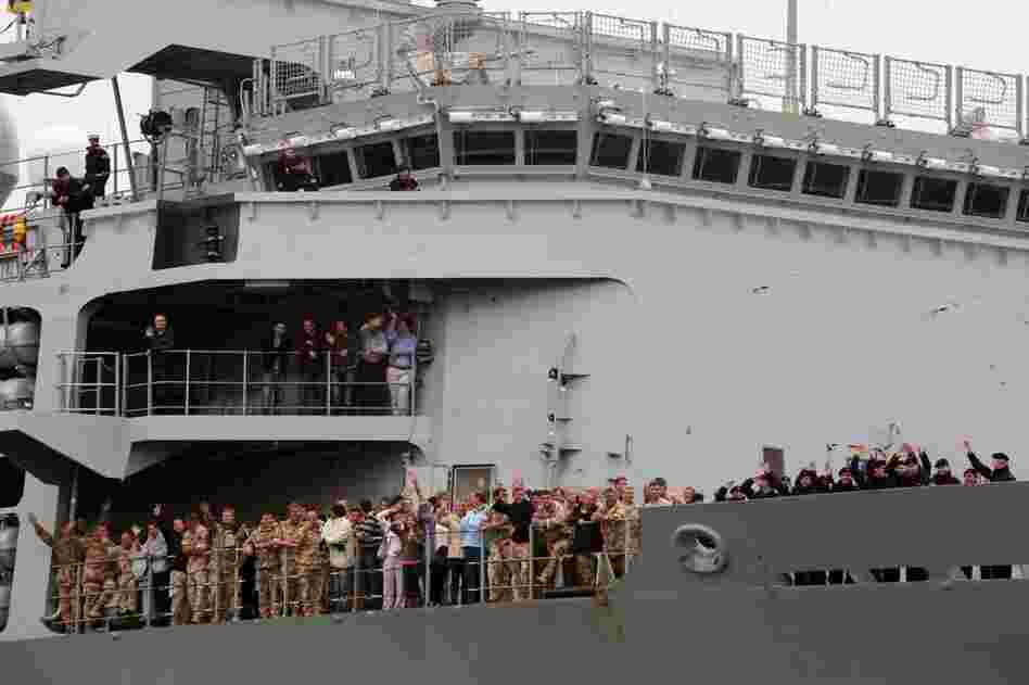 British passengers board HMS Albion on April 20 in Santander, Spain. The Royal Navy's ship, carrying service personnel home from Afghanistan, stopped to collect approximately 200 British citizens who were left stranded when their flights were canceled because of volcanic ash. 