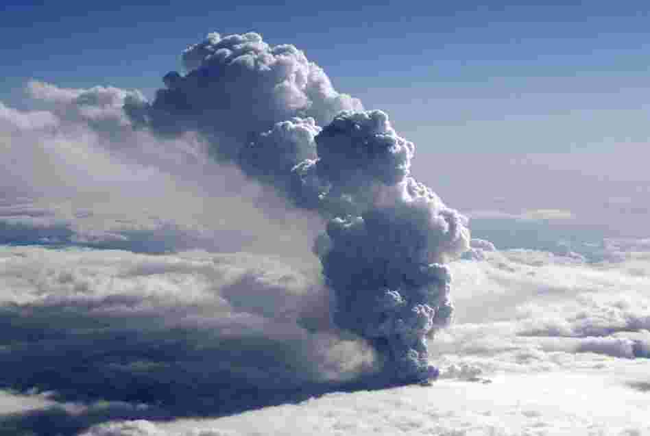 Smoke billows from an erupting volcano near the Eyjafjallajokull glacier on April 14, near Reykjavik. 