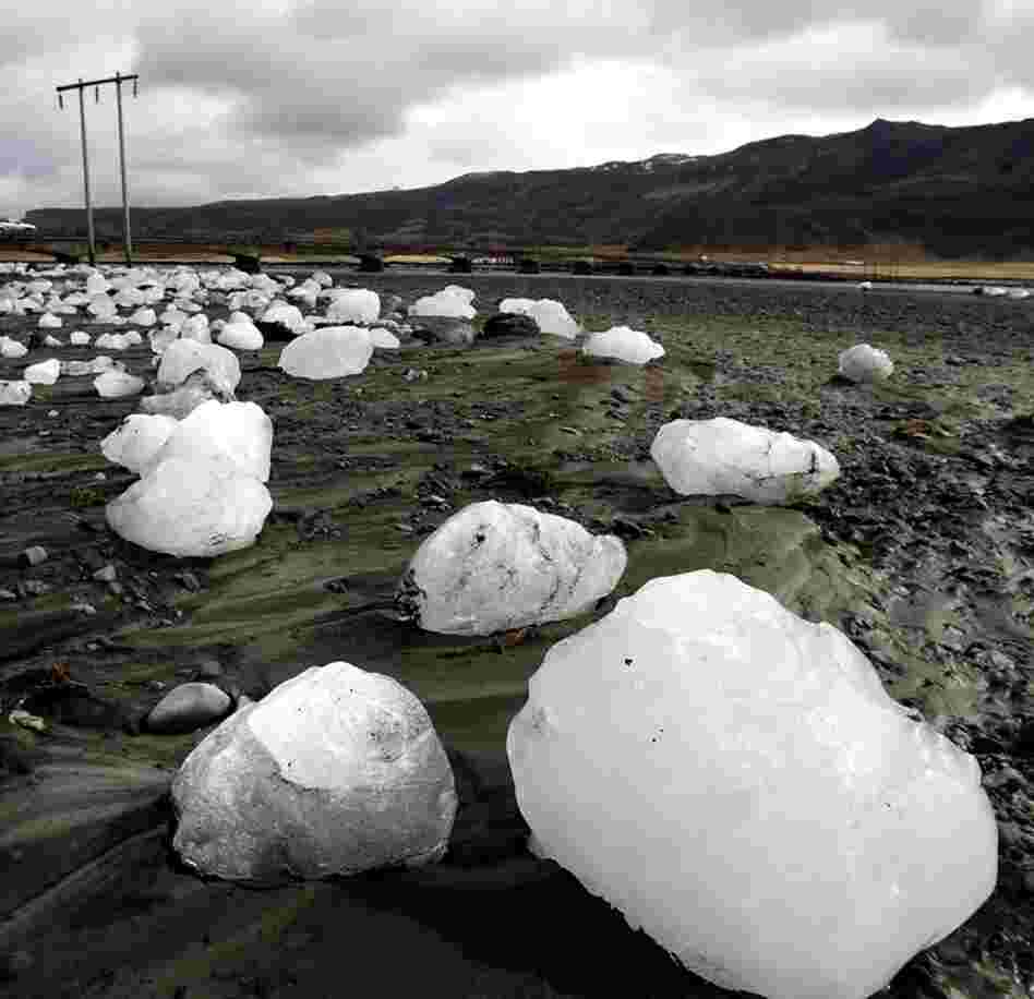 Ice chunks carried downstream by floodwaters caused by volcanic activity lie on the Markarfljot riverbank April 16, about 75 miles east of Iceland's capital of Reykjavik. 