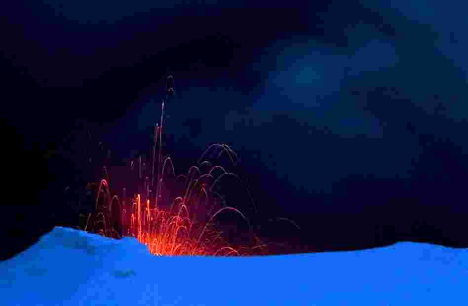 Lava erupts from the volcano under Iceland's Eyjafjallajokull glacier on April 19.  Europe began to emerge from a volcanic cloud Monday, allowing limited air traffic to resume and giving hope to millions of travelers stranded around the world. 