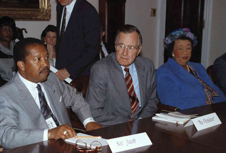 President George H. Bush meets with Height and John Jacob of the Urban League, meet in the Cabinet Room of the White House in Washington on May 1, 1992. The president met with civil rights leaders to discuss the rioting in Los Angeles. 