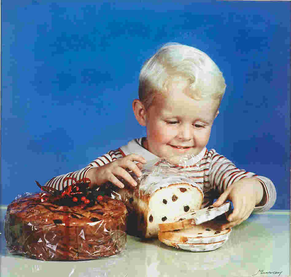 Boy with raisin bread, photograph for the cover of McCall's Homemaking Magazine, circa 1944