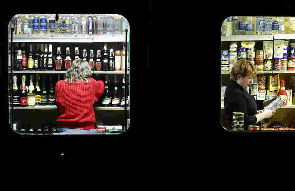 "In Sukachi, Ukraine, a small food and liquor store in a converted trailer doubles as the village bar. The store's two employees work up to twelve hours a day and earn about $200 per month. Sukachi, a village of about 2,000, is south of the Chernobyl Exclusion Zone."