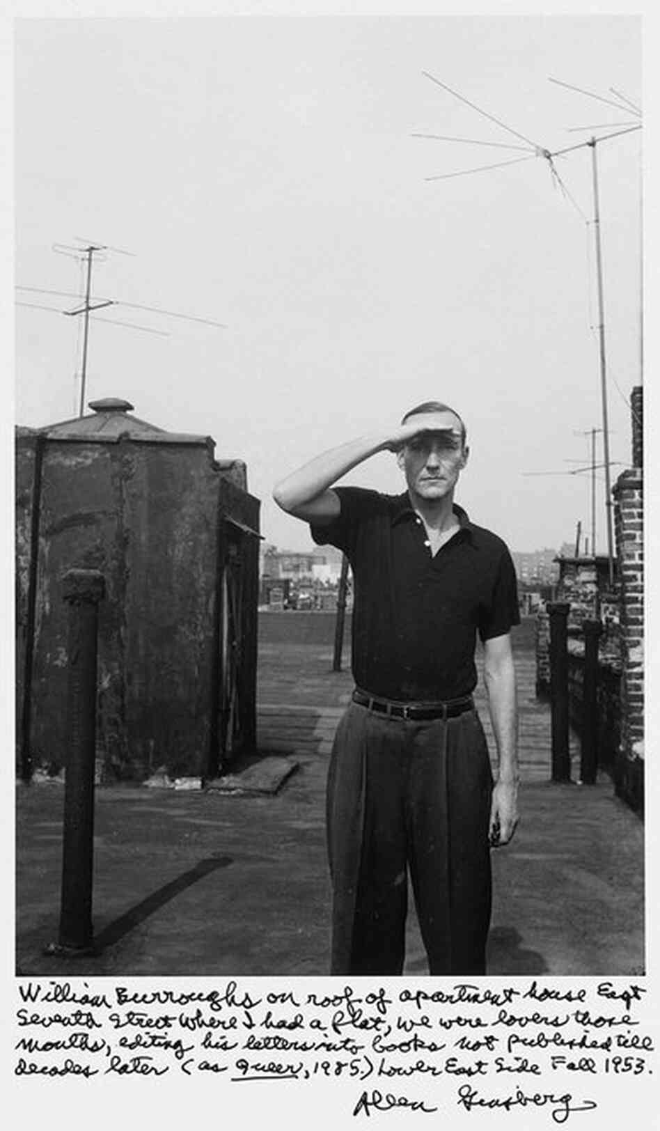 "William Burroughs on roof of apartment house East Seventh Street where I had a flat, we were lovers those months, editing his letters into books not published til decades later (as Queer, 1985) Lower East Side Fall 1953."