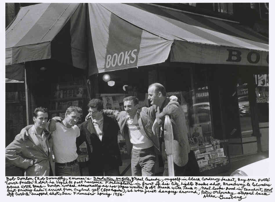 "Bob Donlon (Rob Donnelly, Kerouac's Desolation Angels,), Neal Cassady, myself in black corduroy jacket, Bay Area poets' 'Court Painter' Robert La Vigne & poet Lawrence Ferlinghetti in front of his City Lights book shop, Broadway & Columbus Avenue North Beach. ... San Francisco spring 1956."
