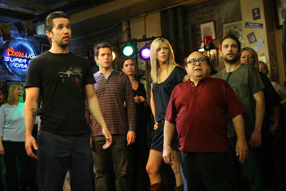 Danny DeVito, in red shirt, actor, 5 feet, on the set of It's Always Sunny In Philadelphia 