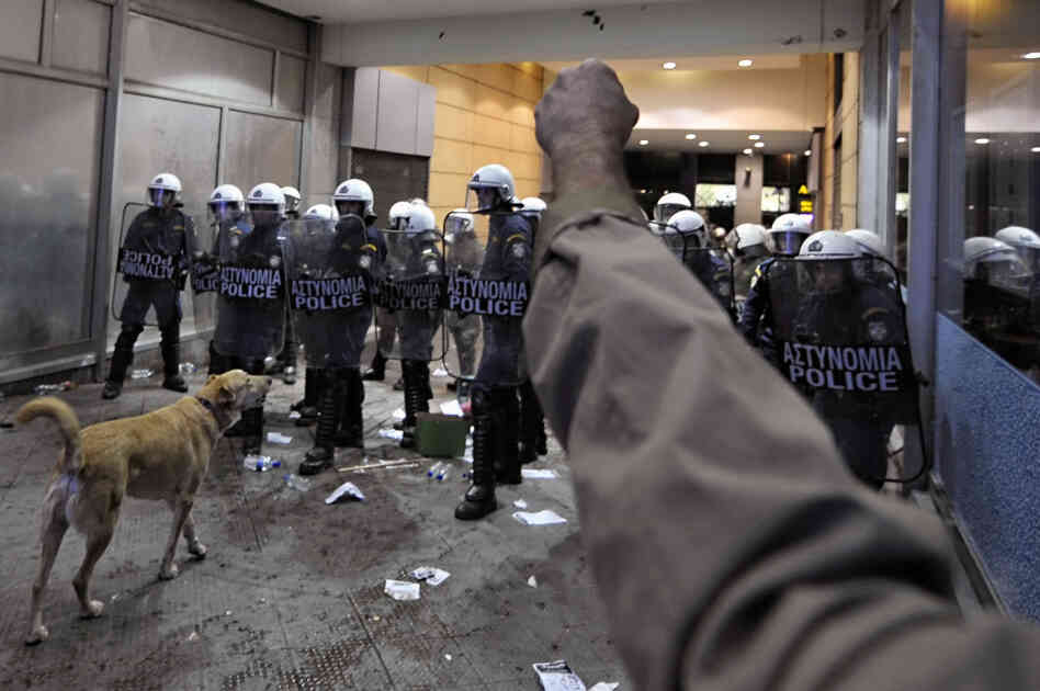 A demonstrator rises his fist in front o A demonstrator rises his fist in front o