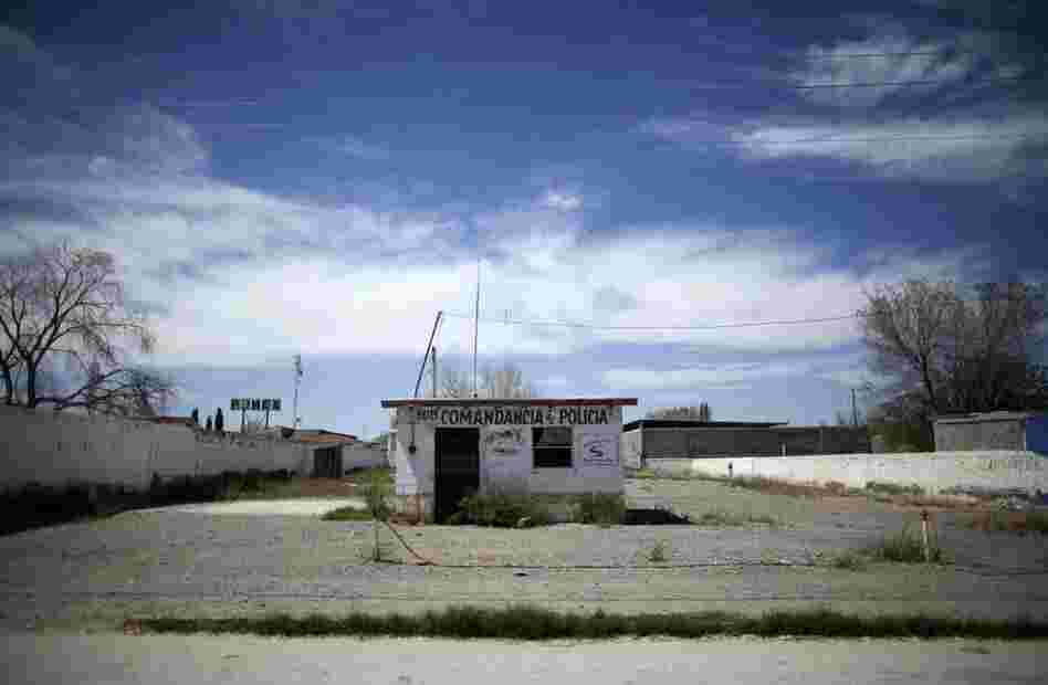 An abandoned police sub-station at El Porvenir, in Mexico's Juarez Valley. Amid a fight by drug cartels, hundreds of families are fleeing the cotton-farming towns of the valley, a stretch of border 50 miles east of Ciudad Juarez. Mexican drug cartels are terrorizing residents, emptying the area. 