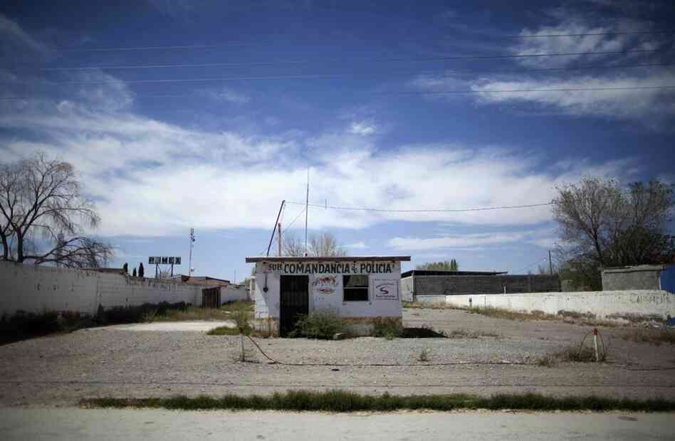 An abandoned police sub-station at El Porvenir, in Mexico's Juarez Valley. Amid a fight by drug cartels, hundreds of families are fleeing the cotton-farming towns of the valley, a stretch of border 50 miles east of Ciudad Juarez. Mexican drug cartels are terrorizing residents, emptying the area. 