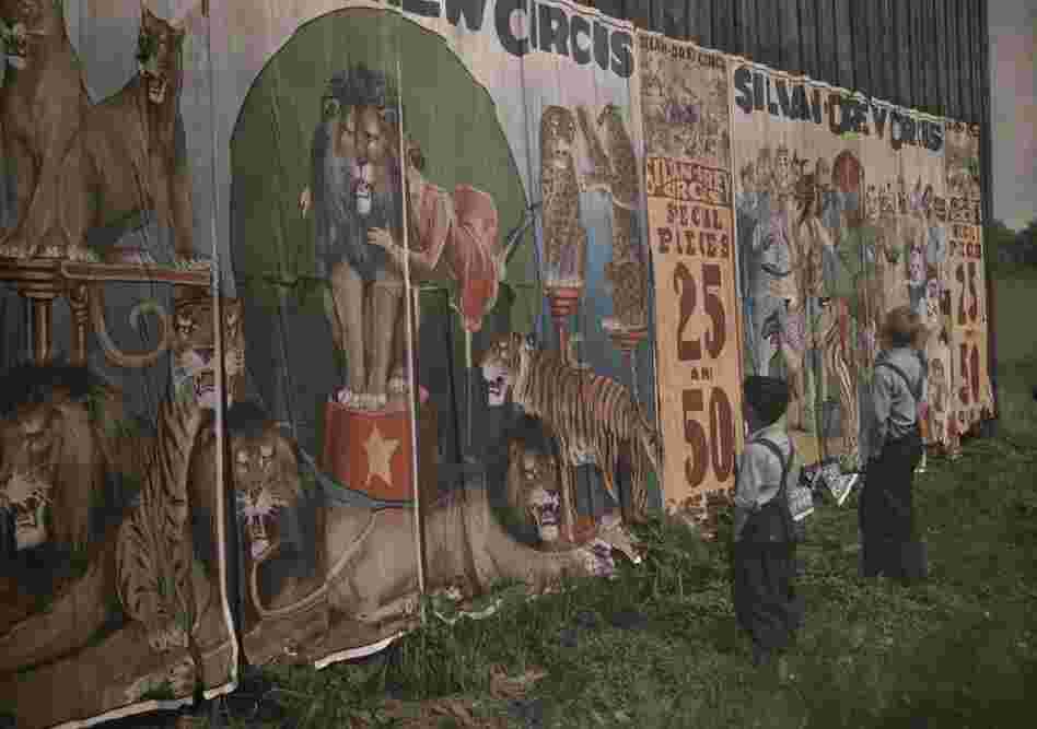 Children read the coming attractions of the traveling Silvan Drew Circus, Bristolville, Ohio, published 1931 