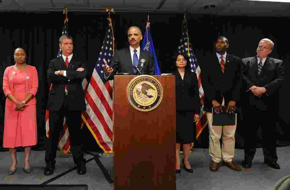 U.S. Attorney General Eric Holder announces that the Justice Department has launched a criminal investigation into the BP oil spill. With him, from left: Stephanie Finley and Jim Letten, U.S. attorneys for the Western District of Louisiana; Ignacia Moreno, assistant attorney general for the Environment and Natural Resources Division; Tony West, assistant attorney general, Civil Division; and Do...