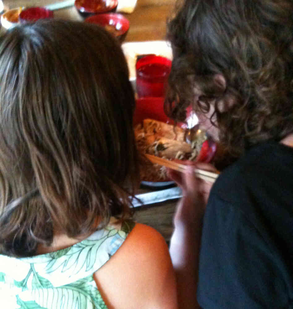 Peter's daughters eating noodles. Peter's daughters eating noodles.