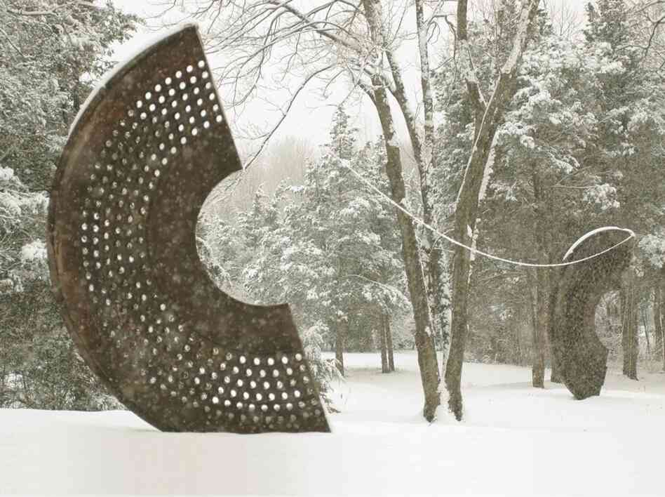 In Millstone 3 (foreground) and Millstone 1 (background) Tufte used scrap metal from a power plant to play with circles and light. 