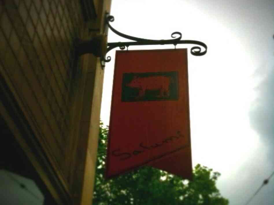 Sign on Salumi restaurant in Seattle. Sign on Salumi restaurant in Seattle.