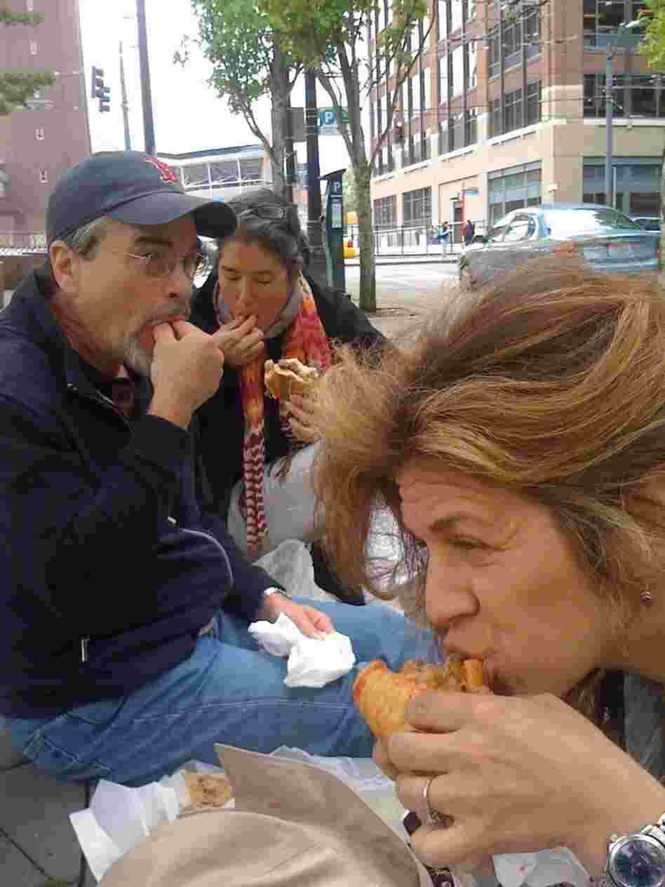 Enjoying sandwiches at Salumi. Enjoying sandwiches at Salumi.