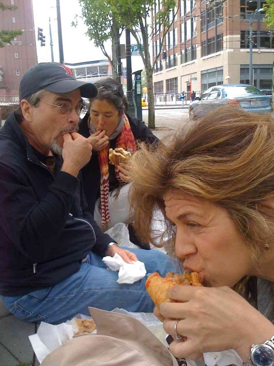 Enjoying sandwiches at Salumi. Enjoying sandwiches at Salumi.
