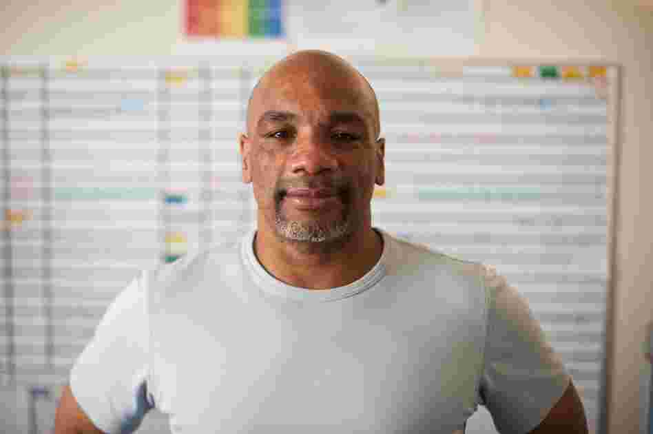 Director of Nursing Johnny Dennis formerly served in the military. He now supervises staff at Mentis who assist with therapy and take patients on outings designed to make them more comfortable in social settings.