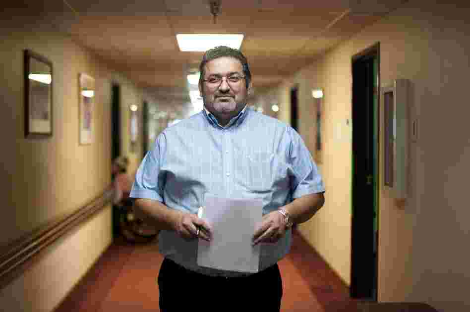 Administrator Jose Huerta stands in the main hallway at Mentis. The center combines physical and cognitive rehabilitation to help patients reintegrate into society.