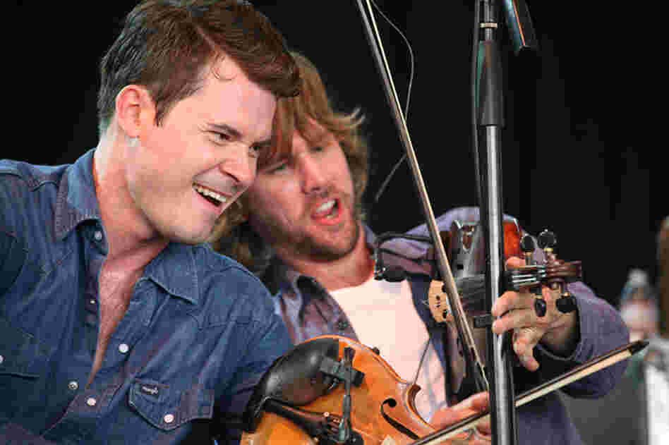 Members of the Dave Rawlings Machine caught in mid-hoedown. 