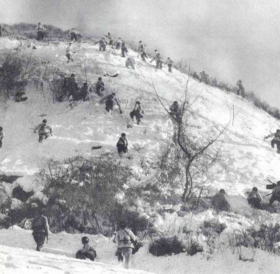 Lines of Chinese infantry on a hilltop position in their shock offensive of November 1950. 