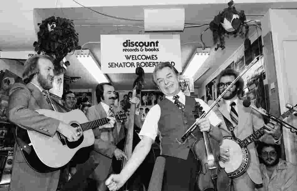 Fiddle in hand, Byrd leads The Country Gentlemen in a song at a Washington record store in 1978. Byrd, who learned the fiddle as a boy growing up in West Virginia, appeared at the store to promote his album Mountain Fiddler. 