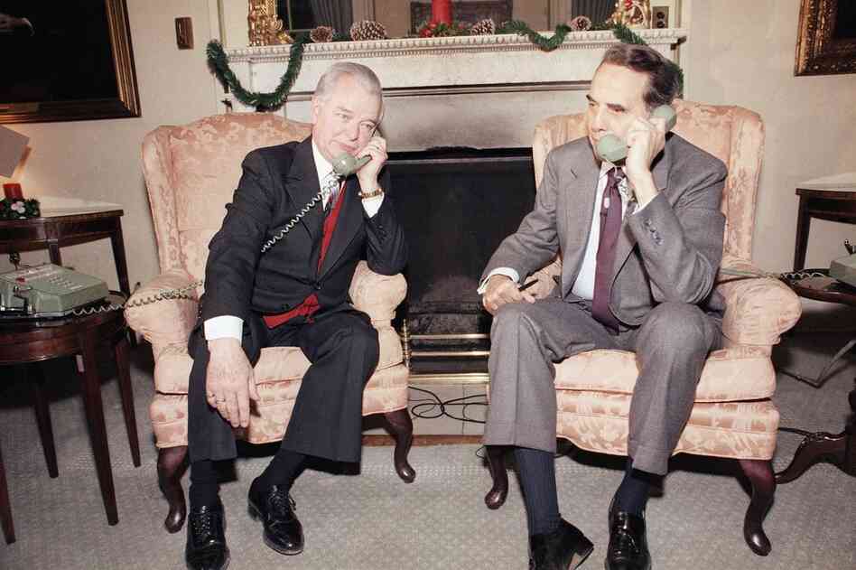 Byrd and Sen. Robert Dole (R-KS) speak to President Reagan in 1985, after the first session of the 99th Congress adjourned. Byrd's time as a senator spanned 11 presidencies. 