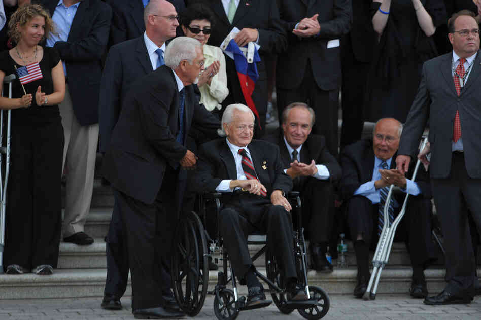 Byrd, seated in a wheelchair, awaits the hearse carrying the remains of Sen. Edward Kennedy in August 2009 in Washington. Byrd and Kennedy served together in the Senate for nearly 50 years.  