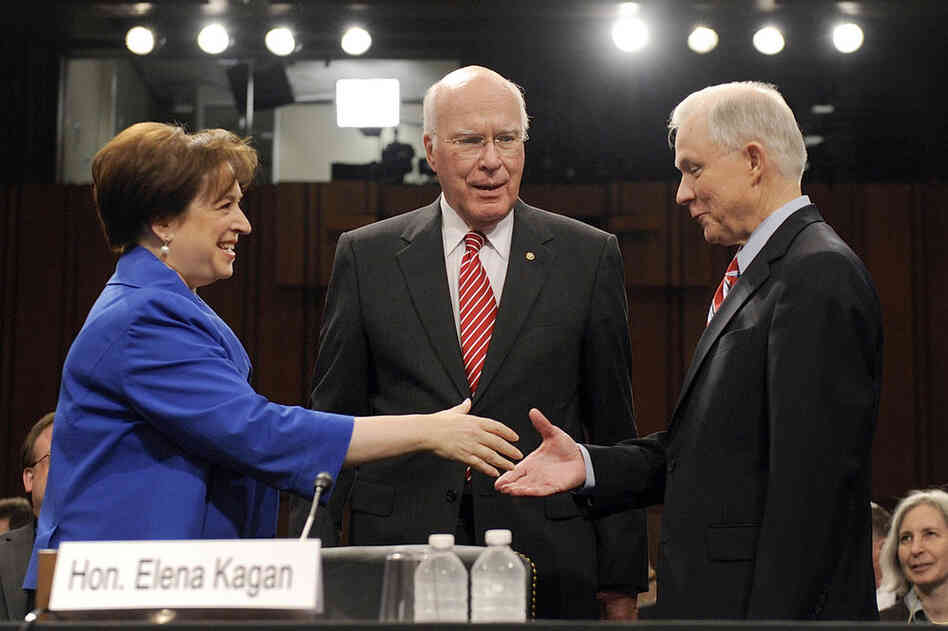 Elena Kagan shakes hands with GOP Sen. Jeff Sessions (right) as Democratic Sen. Patrick Leahy looks on before the start of the confirmation hearing, June 28.  
