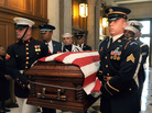 The flag-draped coffin carrying Sen. Rob The flag-draped coffin carrying Sen. Rob