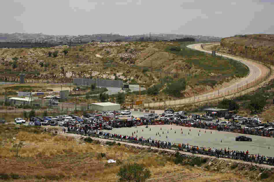 The Speed Sisters race cars in Ramallah. The track is adjacent to the border with Israel and directly next to an Israeli prison that holds Palestinian prisoners.