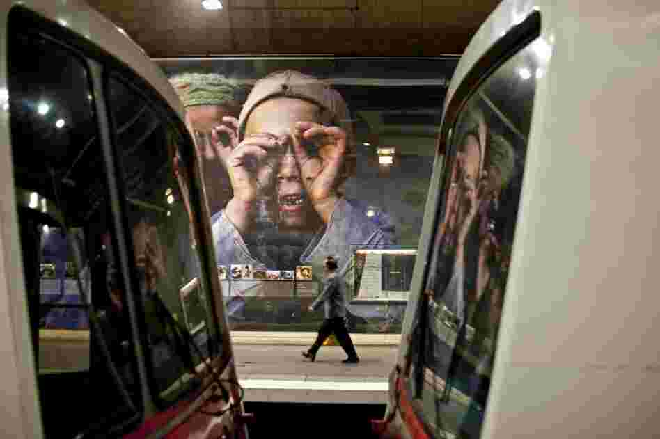 An exhibition of photographs by National Geographic photographer Reza Deghati is found at the Luxembourg metro station.