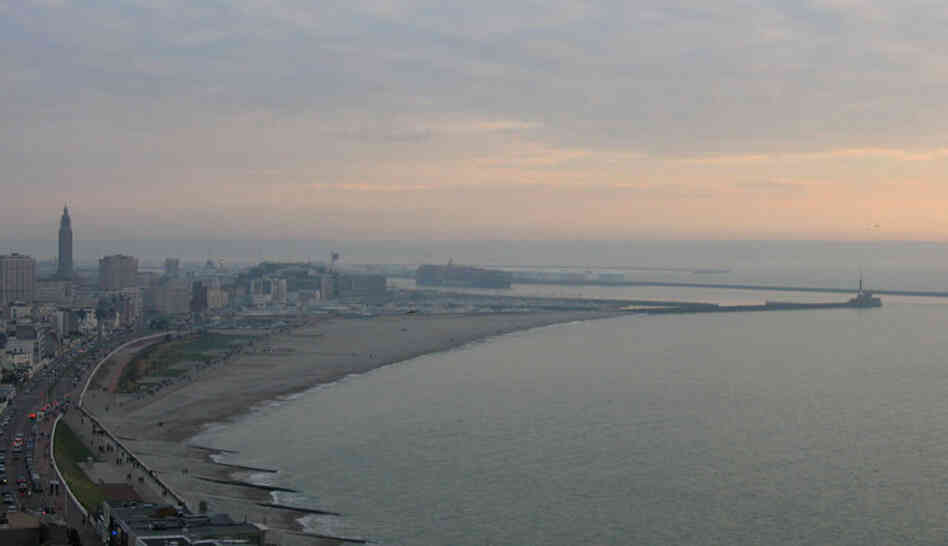 Le Havre Waterfront. Claude Monet grew up in Le Havre, a seaside town in north-western France. Over the course of the 19th century, Le Havre became a thriving industrial center, with much of its economy focused around its busy port. 