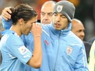 Uruguay's defender Martin Caceres (L) re Uruguay's defender Martin Caceres (L) re