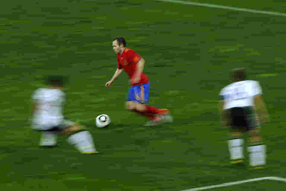 Spain's midfielder Andres Iniesta chases the ball Spain's midfielder Andres Iniesta chases the ball