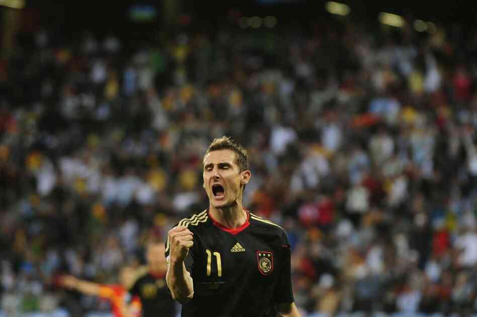 Germany's striker Miroslav Klose celebrates after scoring his team's fourth goal during the quarterfinal match against Argentina. 
