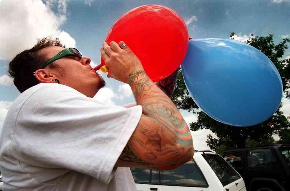 Jim Judeikis, 29, of Baltimore, MD, inhales nitrou Jim Judeikis, 29, of Baltimore, MD, inhales nitrou